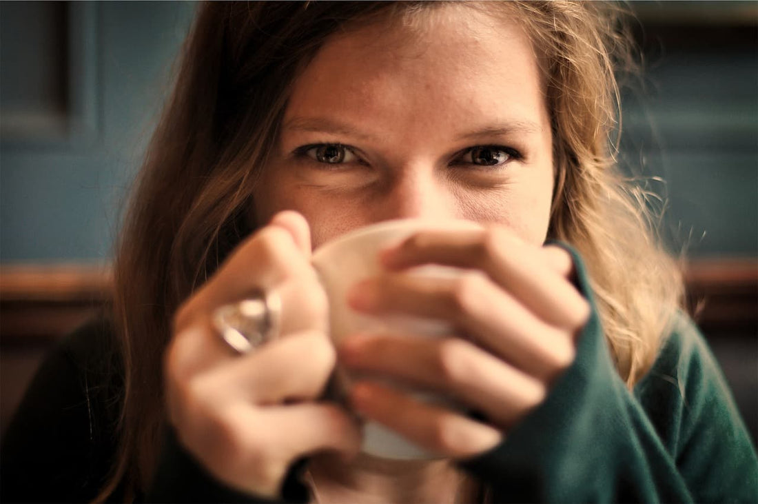 Woman drinking sea moss tea